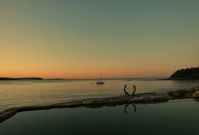 Scenic view of sunset over sea