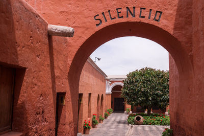 Entrance of historic building against sky