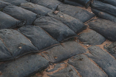 Full frame shot of sacks on sand