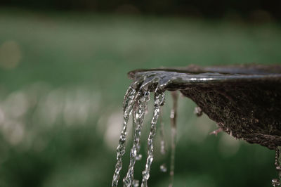 Close-up of water falling from faucet