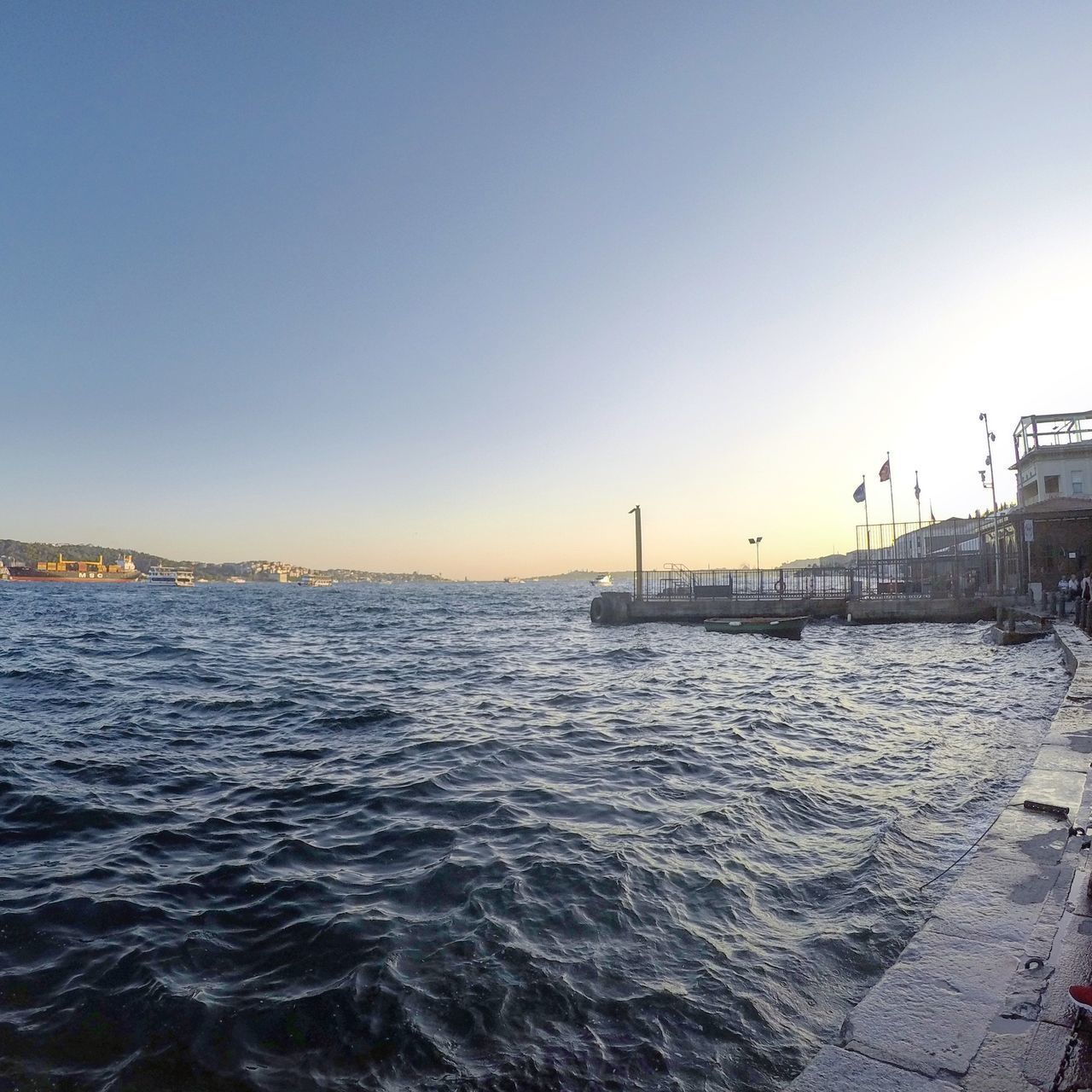 PANORAMIC VIEW OF SEA AGAINST CLEAR SKY