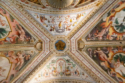 Low angle view of ornate ceiling