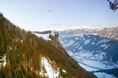 Scenic view of mountains against sky during winter