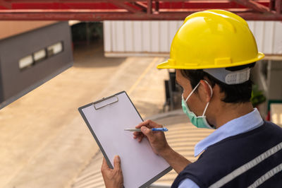 Man working on mobile phone