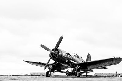 Close-up of airplane against sky