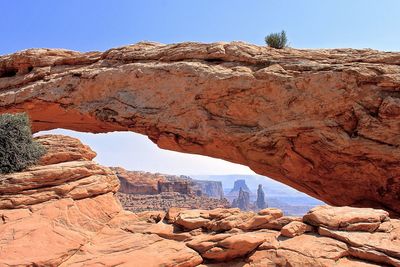 Low angle view of rock formation against sky