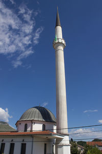 Low angle view of building against blue sky