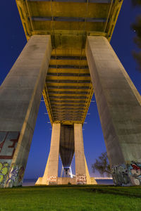 Low angle view of bridge at night