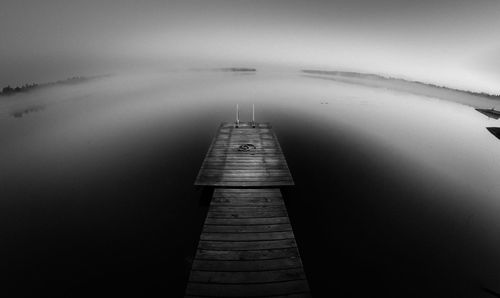 High angle view of pier over lake during dusk