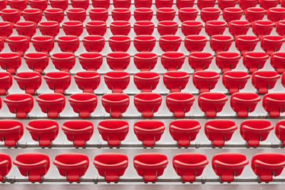 Red stadium seats.