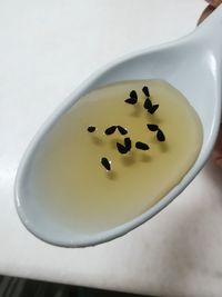 High angle view of black coffee on table