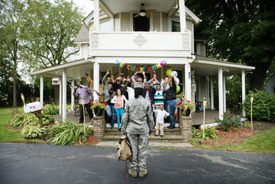 Family welcoming female soldier home