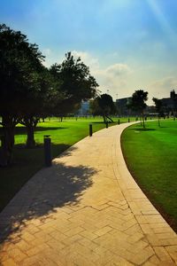 Footpath on grassy field