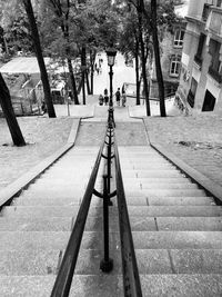 Man walking on sidewalk in city