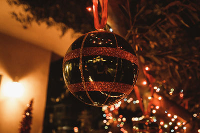 Illuminated christmas tree at night