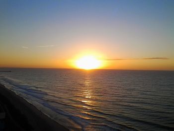 Scenic view of sea at sunset