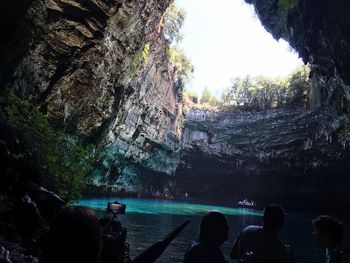 People standing in a lake