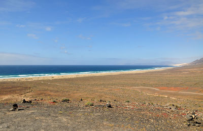 Scenic view of beach against sky