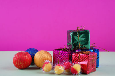 Christmas decorations against yellow background