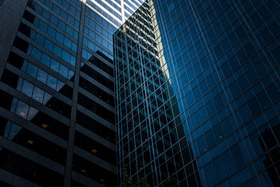 Low angle view of office building against sky