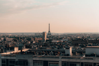 High angle view of city against sky during sunset