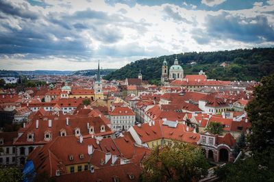 Houses in town against sky