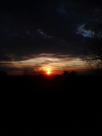 Scenic view of silhouette landscape against sky at night