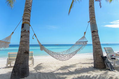 Scenic view of sea against blue sky