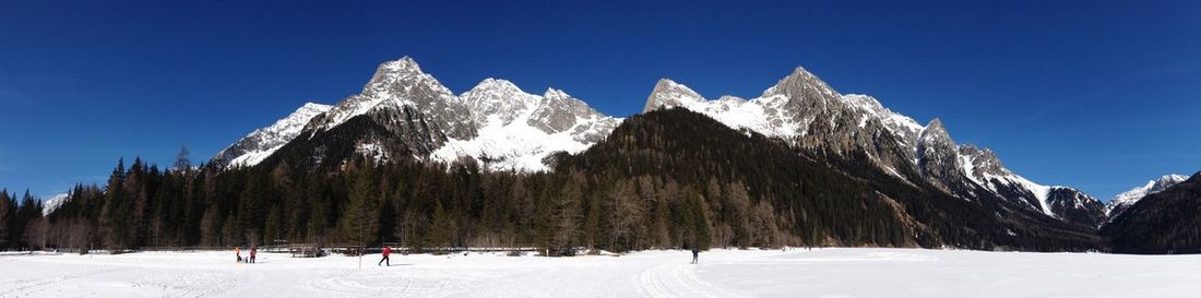 Scenic view of snow covered mountains