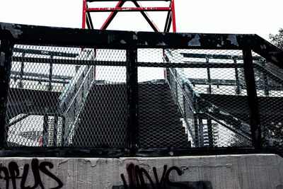 Low angle view of metal structure against sky