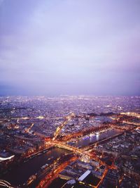 High angle view of illuminated buildings in city against sky