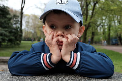 Thoughtful boy looking away