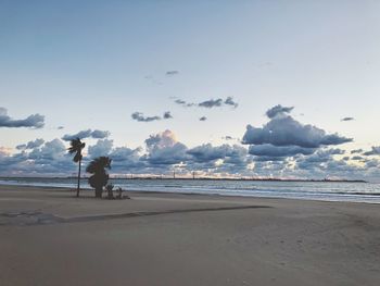 Man on beach against sky