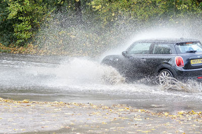 Water flowing through car windshield