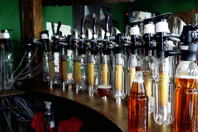 Row of wine bottles on bar counter