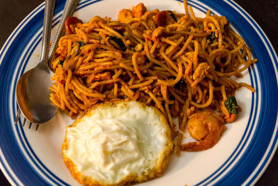 High angle view of noodles and egg in plate