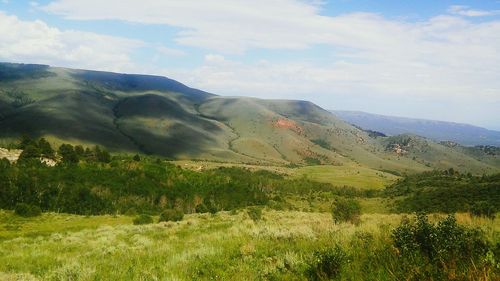 Scenic view of mountains against sky