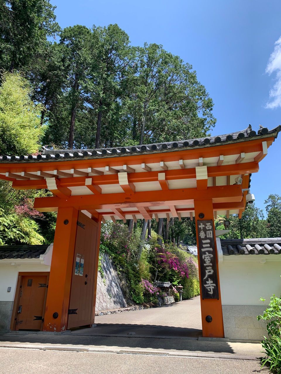 tree, plant, architecture, built structure, no people, nature, religion, belief, sky, growth, place of worship, day, spirituality, building, sunlight, outdoors, building exterior, entrance, shrine