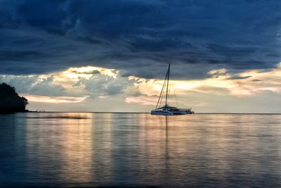 Scenic view of sea against cloudy sky