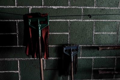 View of mop next to wall
