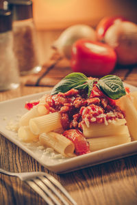 Close-up of strawberries in plate on table