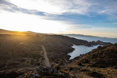 Scenic view of landscape against sky during sunset