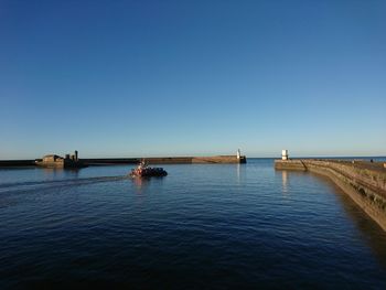 Scenic view of sea against clear sky