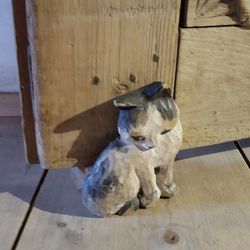 Cat sleeping on wooden floor