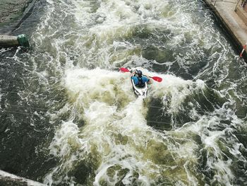 Blurred motion of people in water