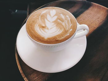 High angle view of cappuccino on table