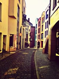 Narrow alley along buildings