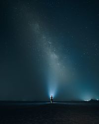 Scenic view of sea against sky at night