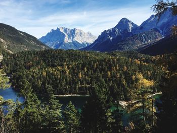 Scenic view of snowcapped mountains against sky