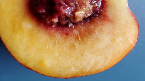 Close-up of fruit over white background